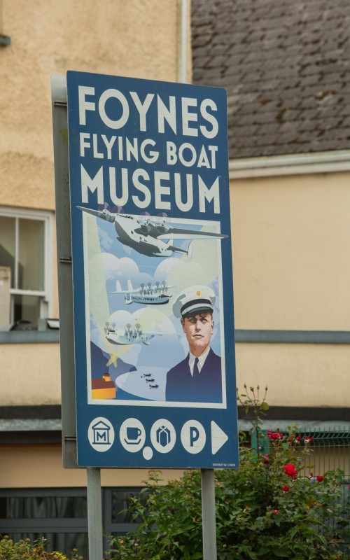 Sign features a pilot and flying boats for the Flying Boat Museum Foynes.