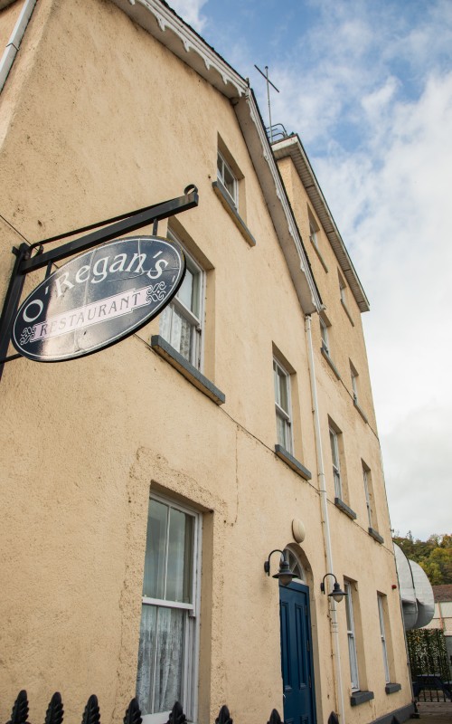 A beige building labelled 