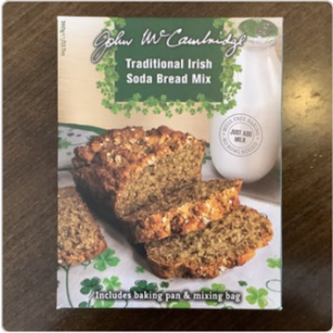 classic Irish soda bread mix with milk and green shamrocks.