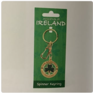 Green shamrock keyring with lucky spinner and Irish text.